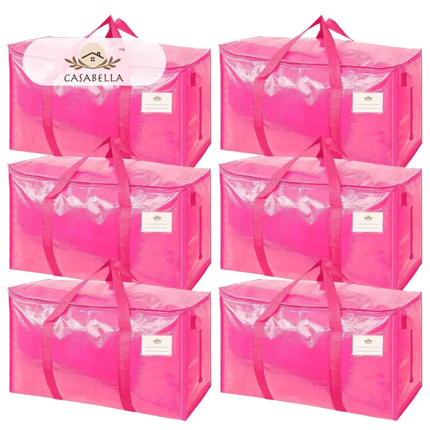 Woman holding a Barbie pink CasaBella moving bag in a bright room